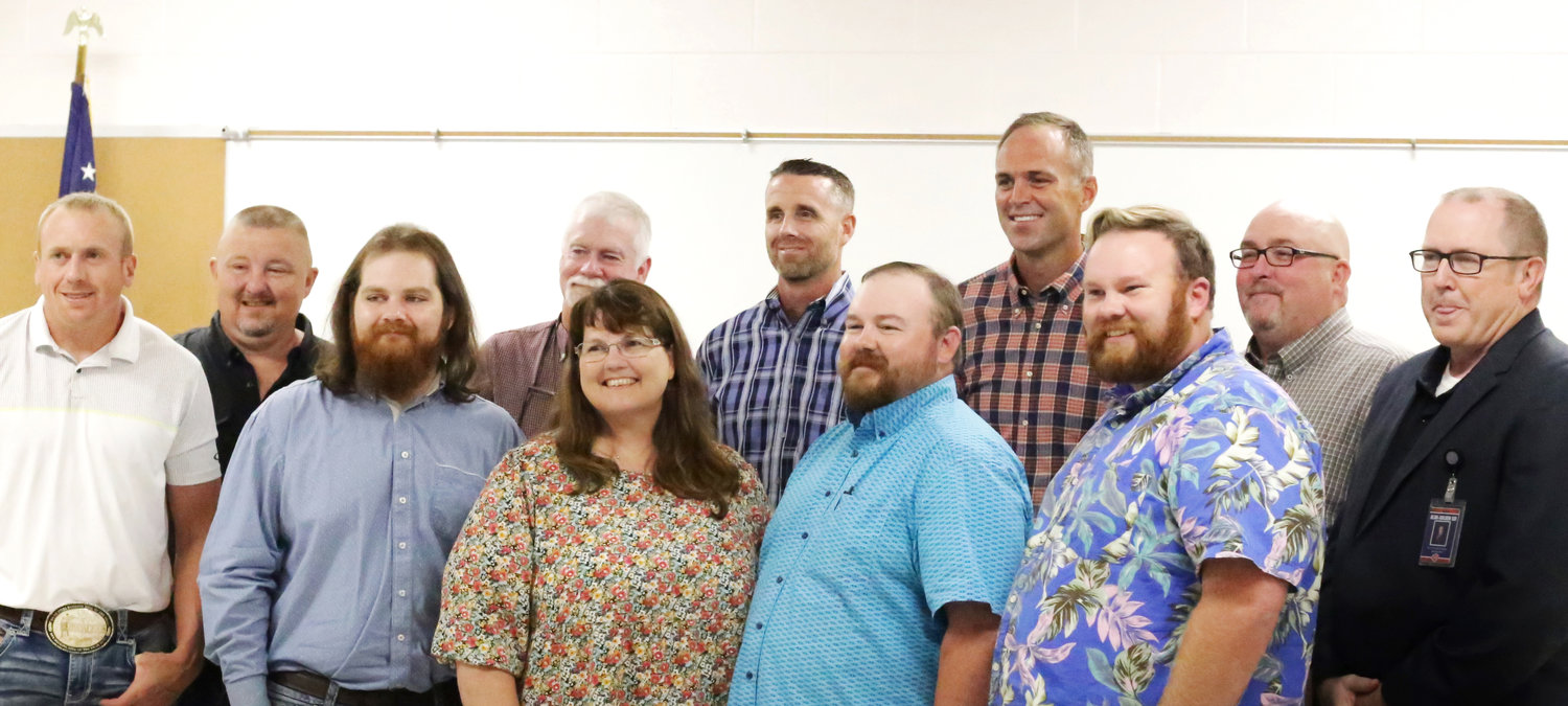 Coincident to naming the Hugh Ragsdale Ag-Science Center, members of the Ragsdale family were hosted by the Alba-Golden school board. From left are Randall Cole, Chad Dailey, Koerth Ragsdale, Mike Ragsdale, Sherry Ragsdale, Jason Stovall, Ethan Ragsdale, Grant Sadler, Cy Ragsdale, Dwayne Thompson and Cole McClendon.